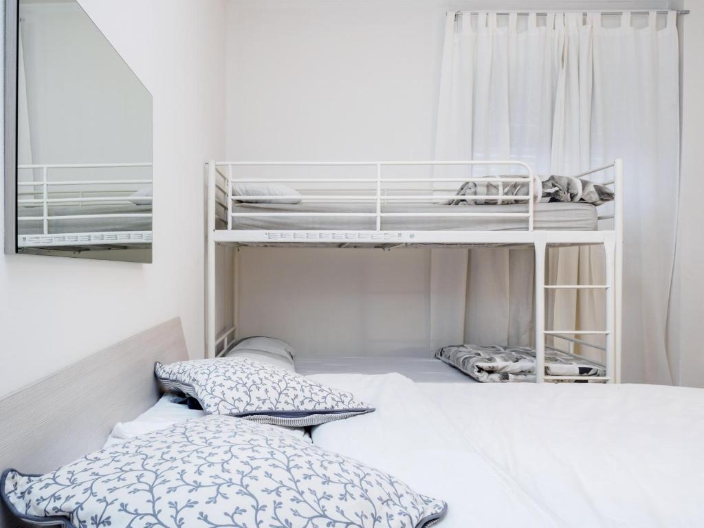 Posteľ alebo postele v izbe v ubytovaní Enjoy Apartment Gorla