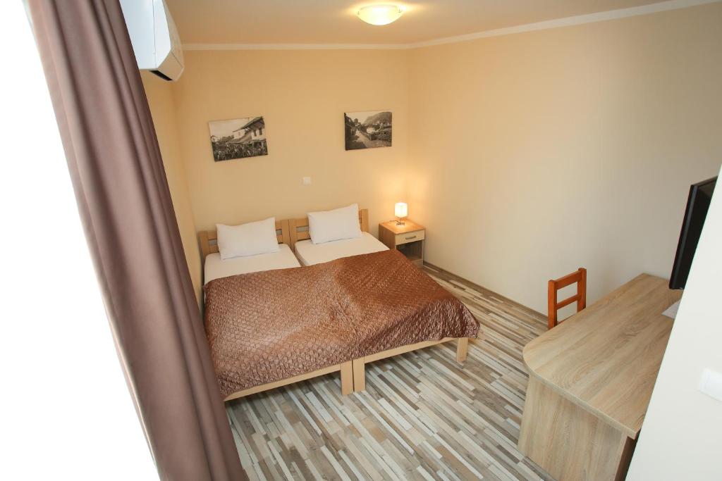 Postel nebo postele na pokoji v ubytování Hotel Hana