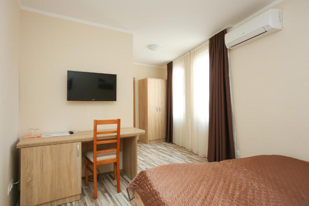 TV a/nebo společenská místnost v ubytování Hotel Hana