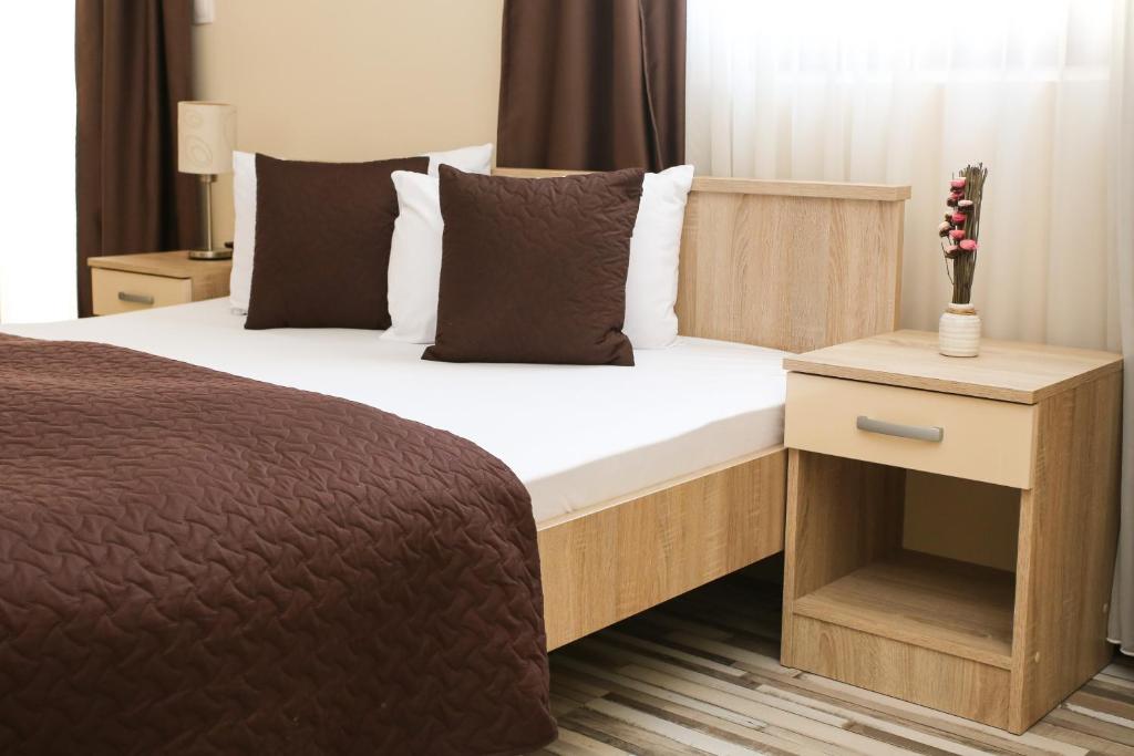 Postel nebo postele na pokoji v ubytování Hotel Hana