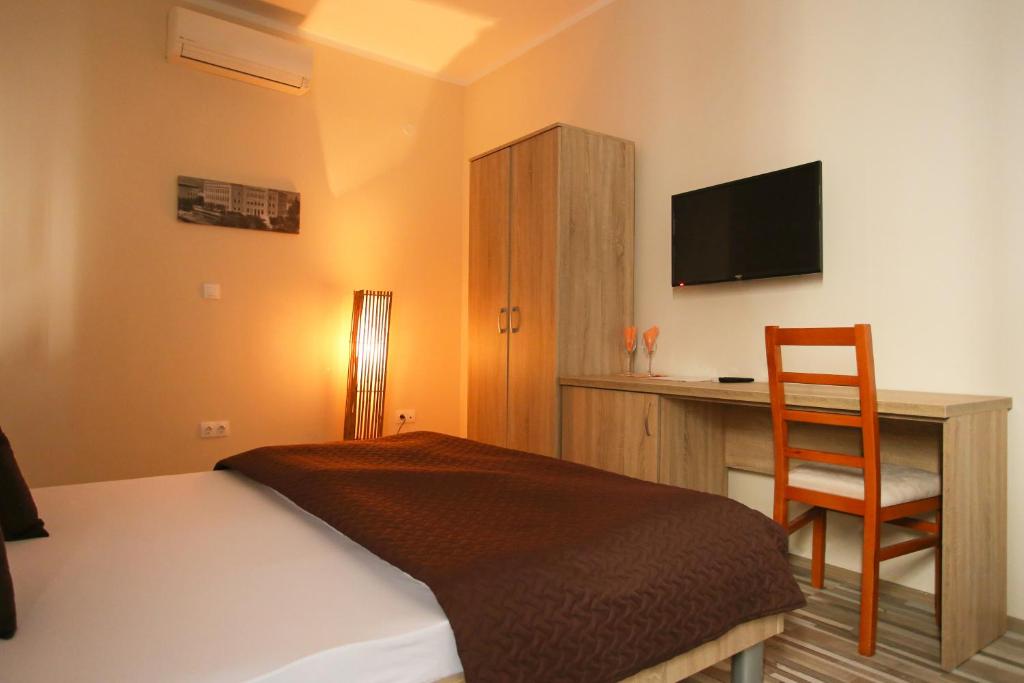 Postel nebo postele na pokoji v ubytování Hotel Hana