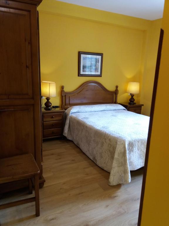 Postel nebo postele na pokoji v ubytování Pension Monteverde