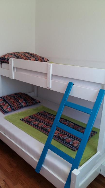 Łóżko lub łóżka w pokoju w obiekcie Apartman Deja