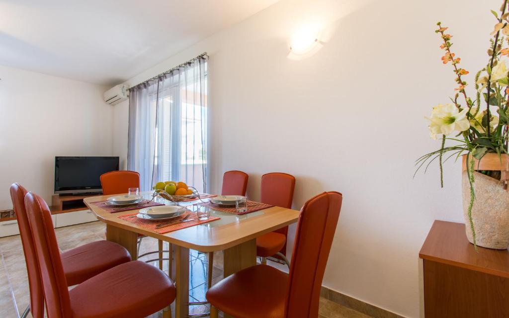Telewizja i/lub zestaw kina domowego w obiekcie Apartman Deja