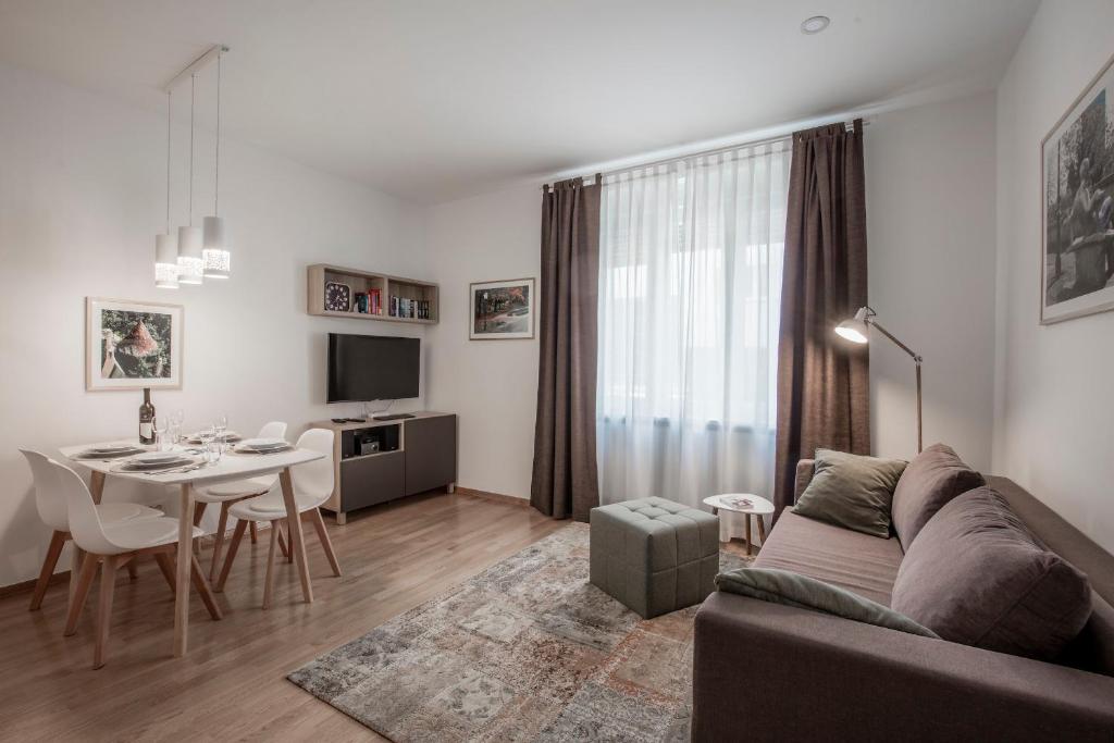 Televízia a/alebo spoločenská miestnosť v ubytovaní Apartments N10 Zagreb