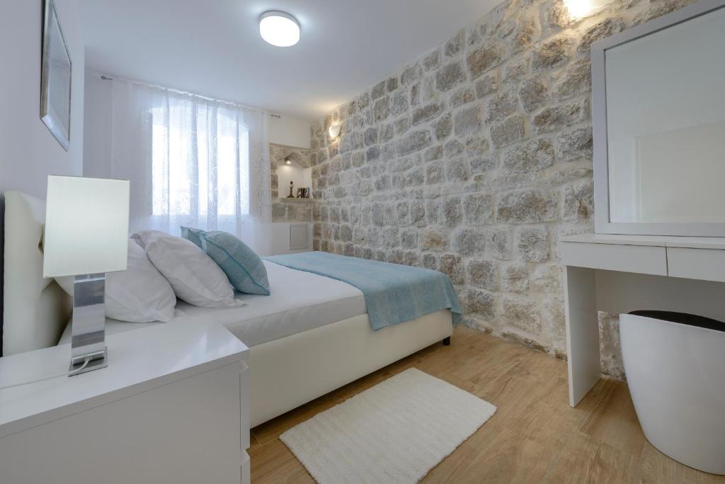TV a/nebo společenská místnost v ubytování San Pietro apartment