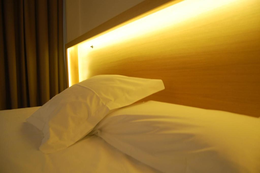 Postel nebo postele na pokoji v ubytování Hotel Araba