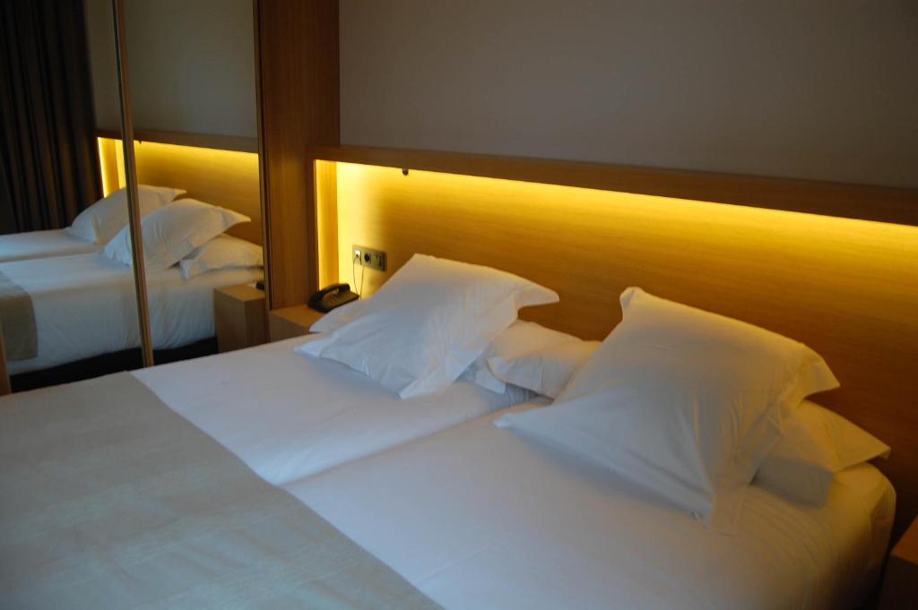 Postel nebo postele na pokoji v ubytování Hotel Araba
