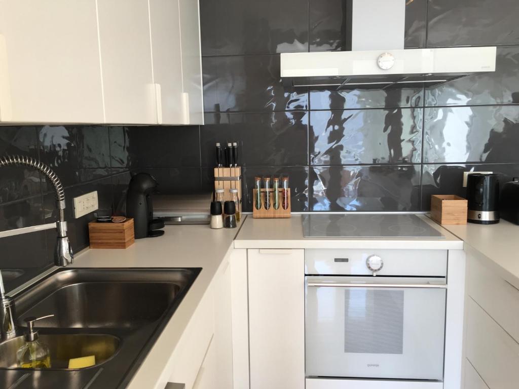 Kuchyňa alebo kuchynka v ubytovaní K Residence Zadar apartment