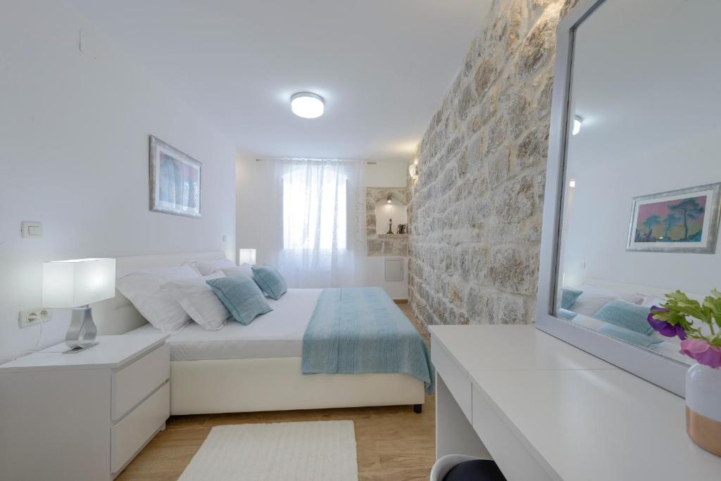 Postel nebo postele na pokoji v ubytování San Pietro apartment