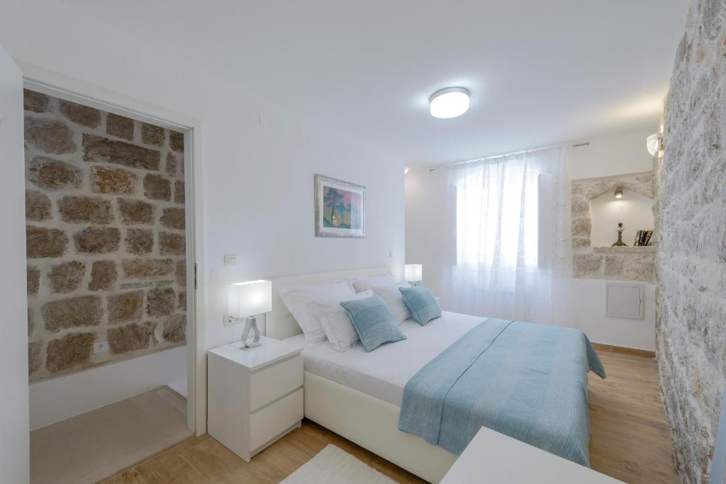 Postel nebo postele na pokoji v ubytování San Pietro apartment