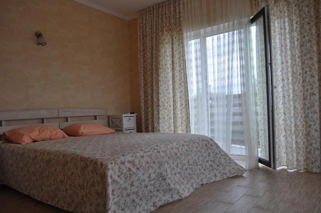 Postel nebo postele na pokoji v ubytování Inn Estio