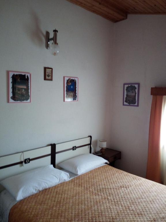 Postel nebo postele na pokoji v ubytování Albergo Al Pino