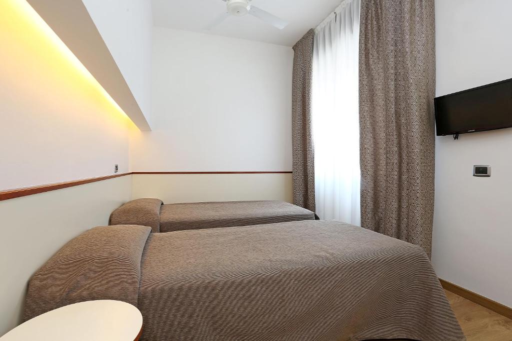 TV a/nebo společenská místnost v ubytování Hotel Corticella