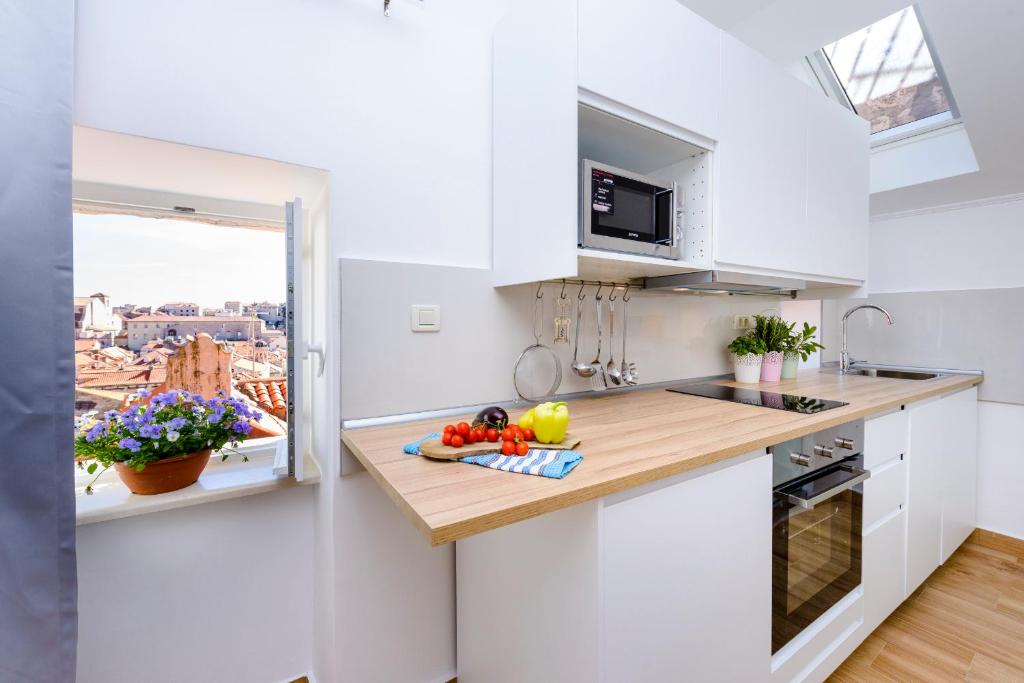 Kuchyň nebo kuchyňský kout v ubytování San Pietro apartment