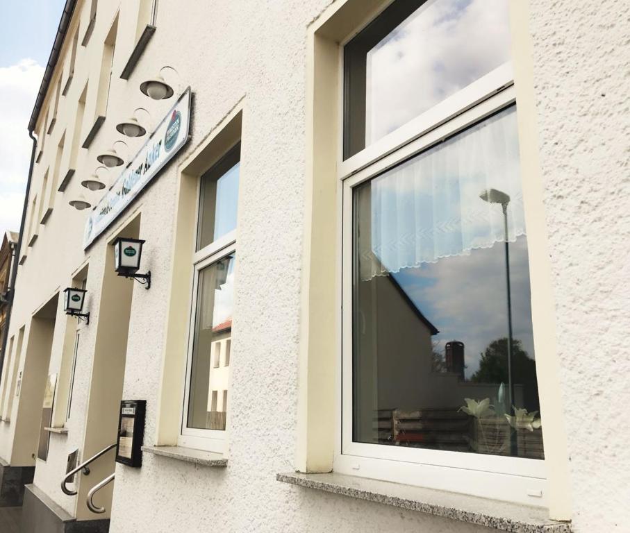 a window on the side of a building at Goldener Anker in Genthin