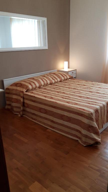 Postel nebo postele na pokoji v ubytování Lili's House