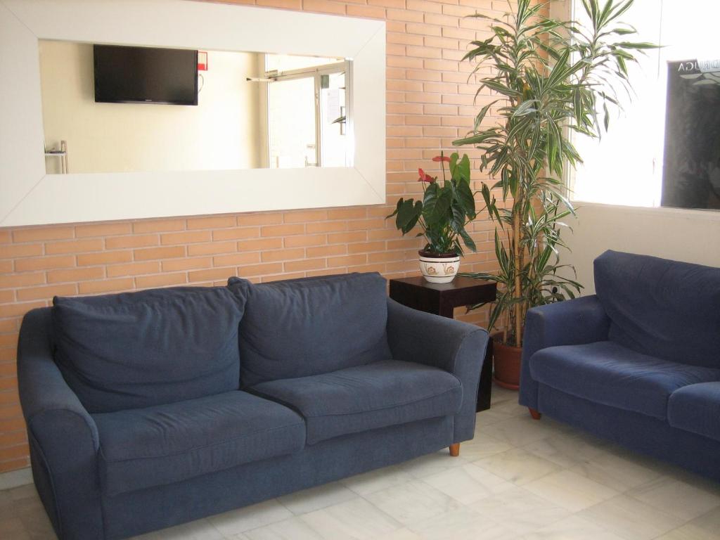 Posedenie v ubytovaní Hostal Madruga