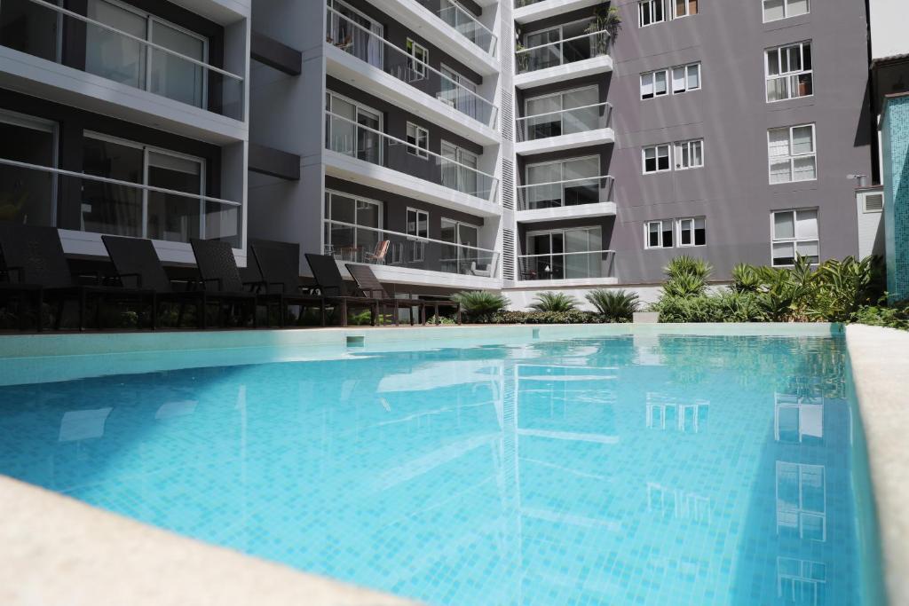 The swimming pool at or near Luxe Miraflores Apartment Pardo