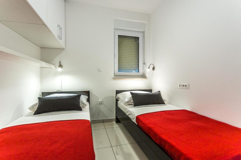 Postel nebo postele na pokoji v ubytování Villa Antonina