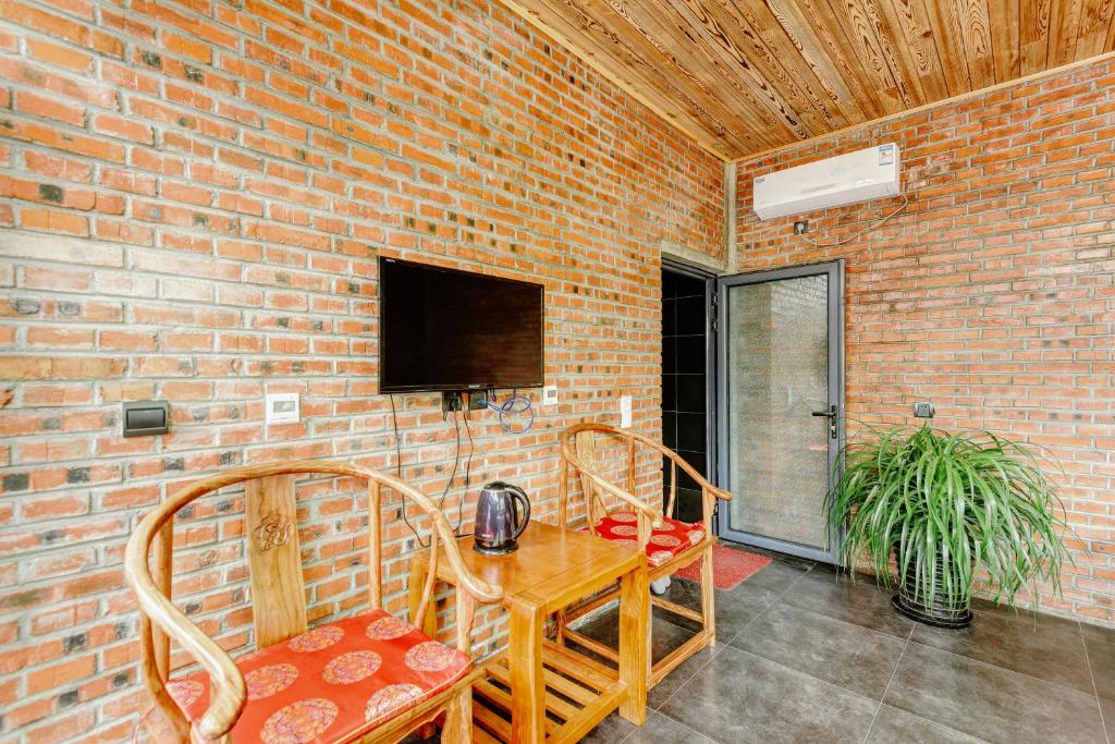 TV o dispositivi per l'intrattenimento presso Beijing Mutianyu Great Wall Wangshanyuan Homestay