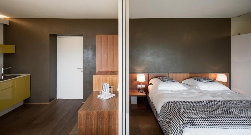 Postel nebo postele na pokoji v ubytování Designhotel Gius La Residenza