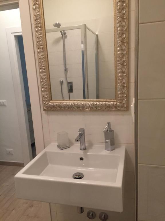 Koupelna v ubytování Ala Garden Apartment