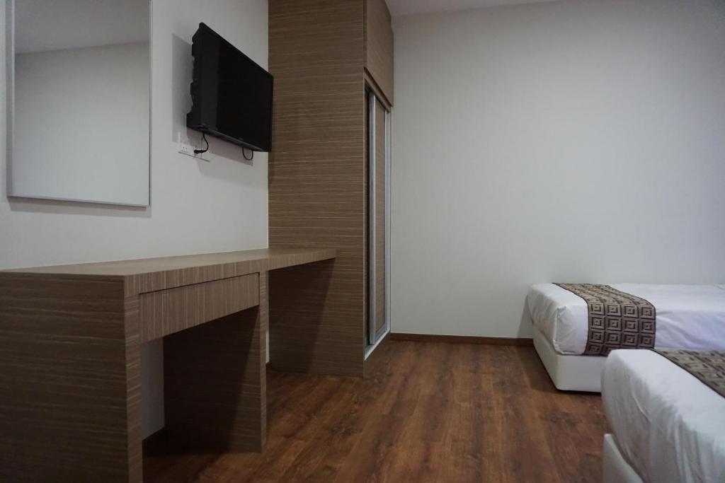Postel nebo postele na pokoji v ubytování Yew Hotel