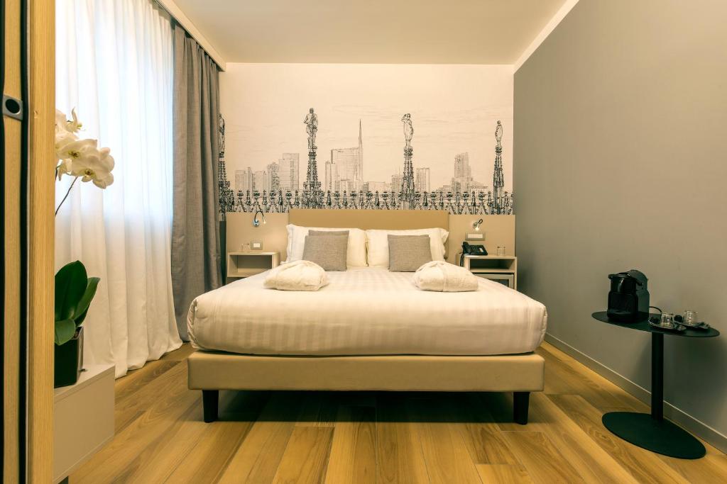 Postel nebo postele na pokoji v ubytování 43 Station Hotel