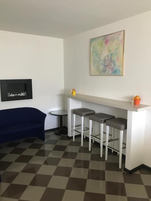TV a/nebo společenská místnost v ubytování Hotel Scaranò