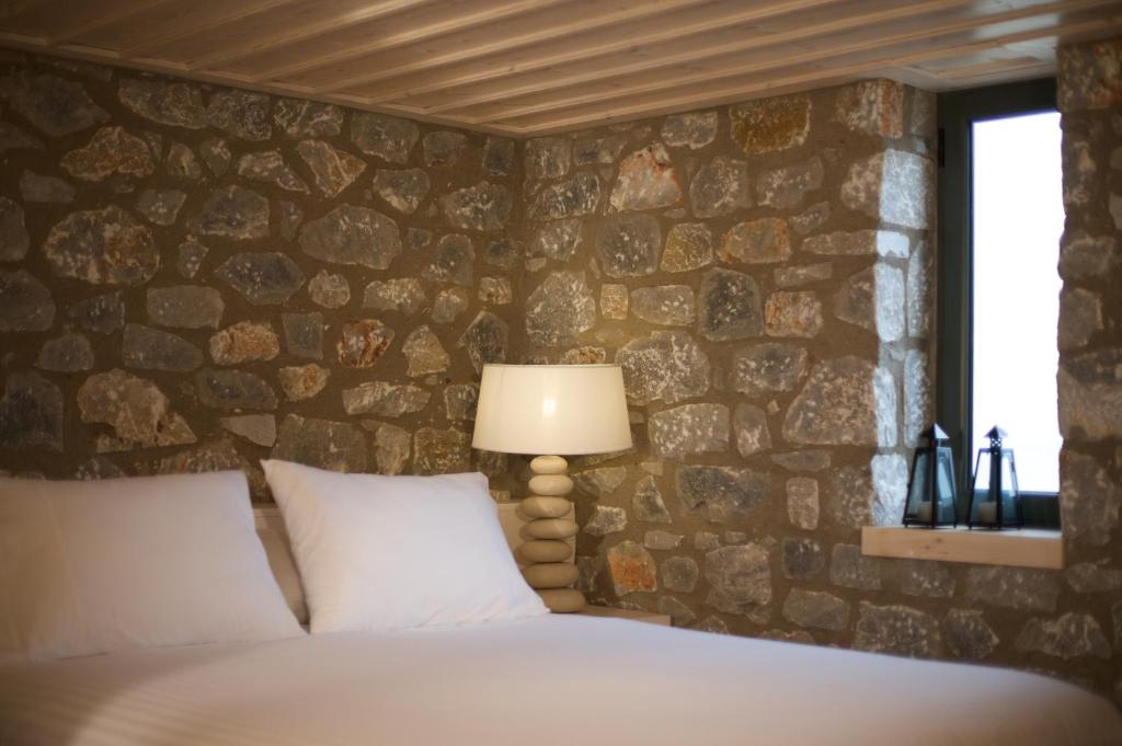 Posteľ alebo postele v izbe v ubytovaní Melitsina Village Hotel