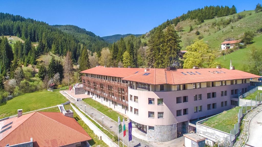 an aerial view of a building in the mountains at Borika Hotel in Chepelare