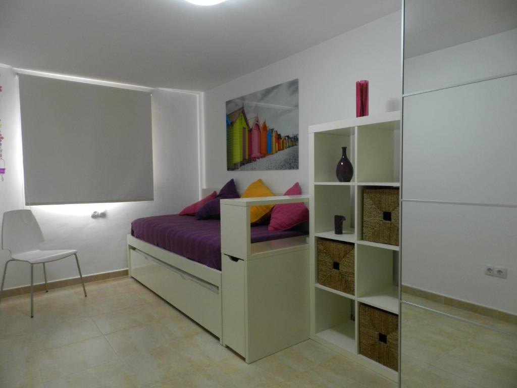 Postel nebo postele na pokoji v ubytování Casa Paradise