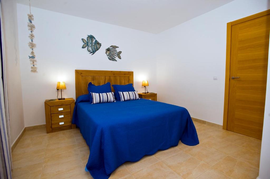 Postel nebo postele na pokoji v ubytování Casa Paradise