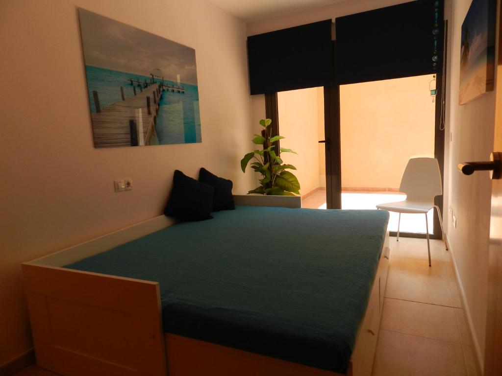 Postel nebo postele na pokoji v ubytování Casa Paradise