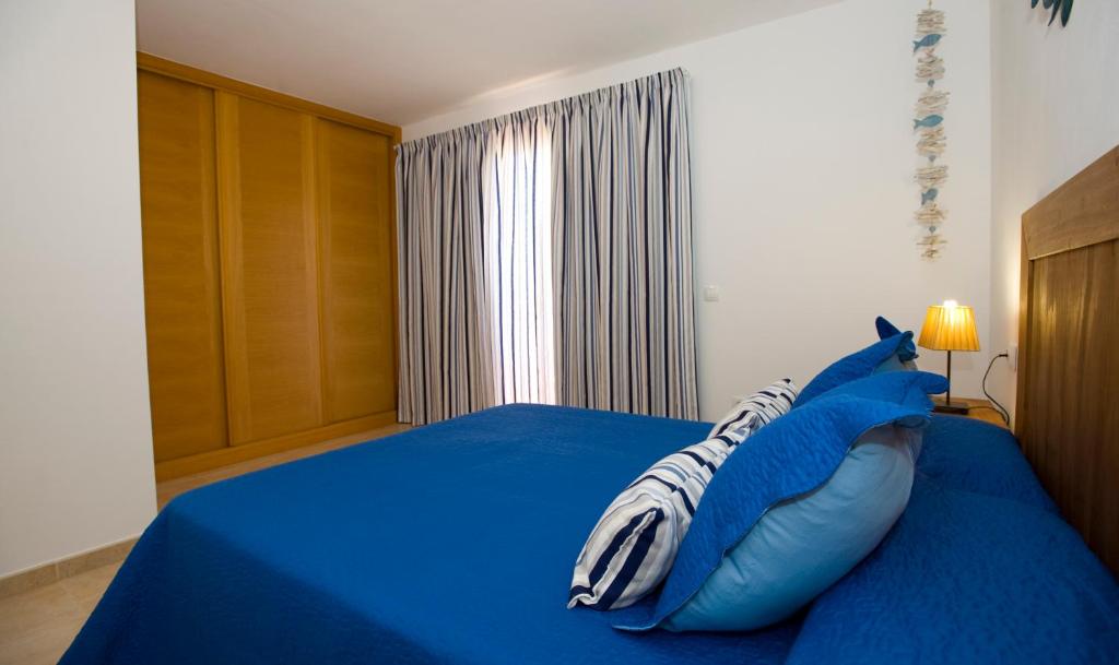 Postel nebo postele na pokoji v ubytování Casa Paradise