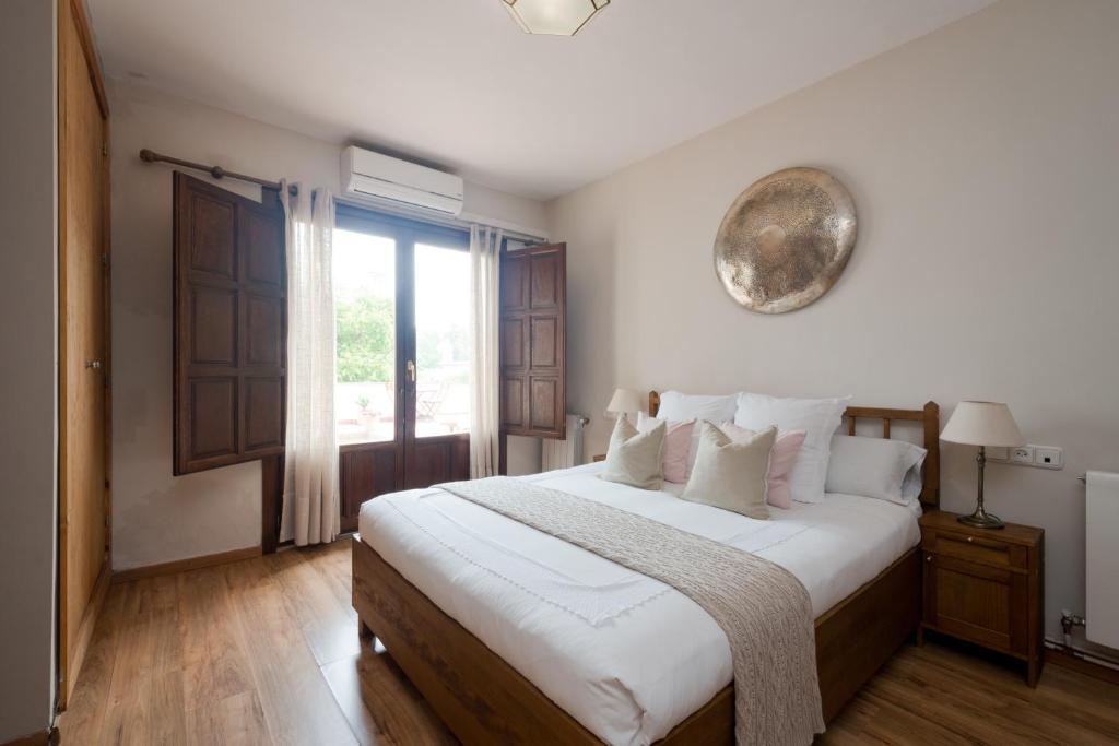 Postel nebo postele na pokoji v ubytování Casa Bombo