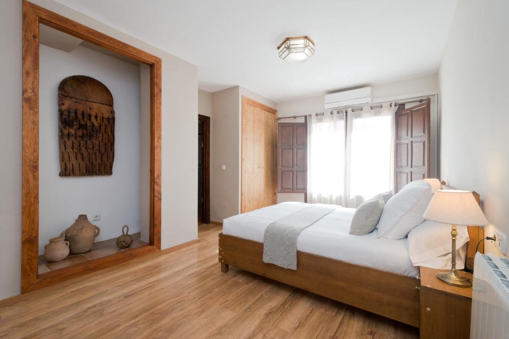 Postel nebo postele na pokoji v ubytování Casa Bombo