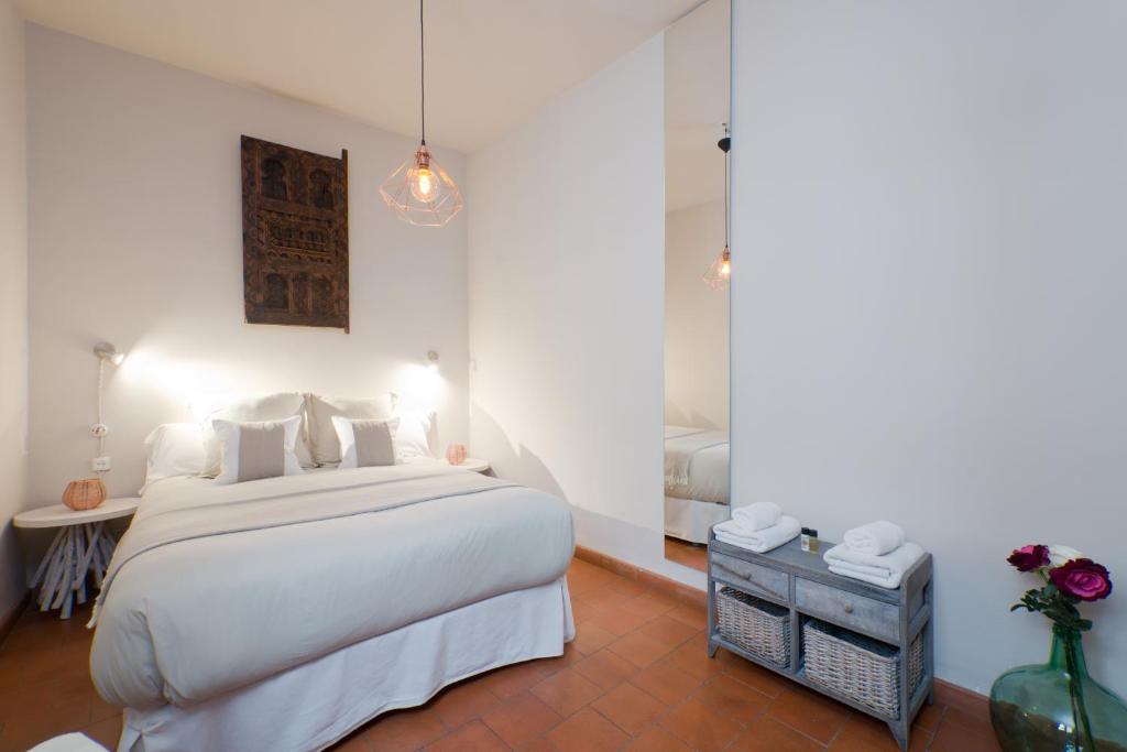Postel nebo postele na pokoji v ubytování Casa Bombo