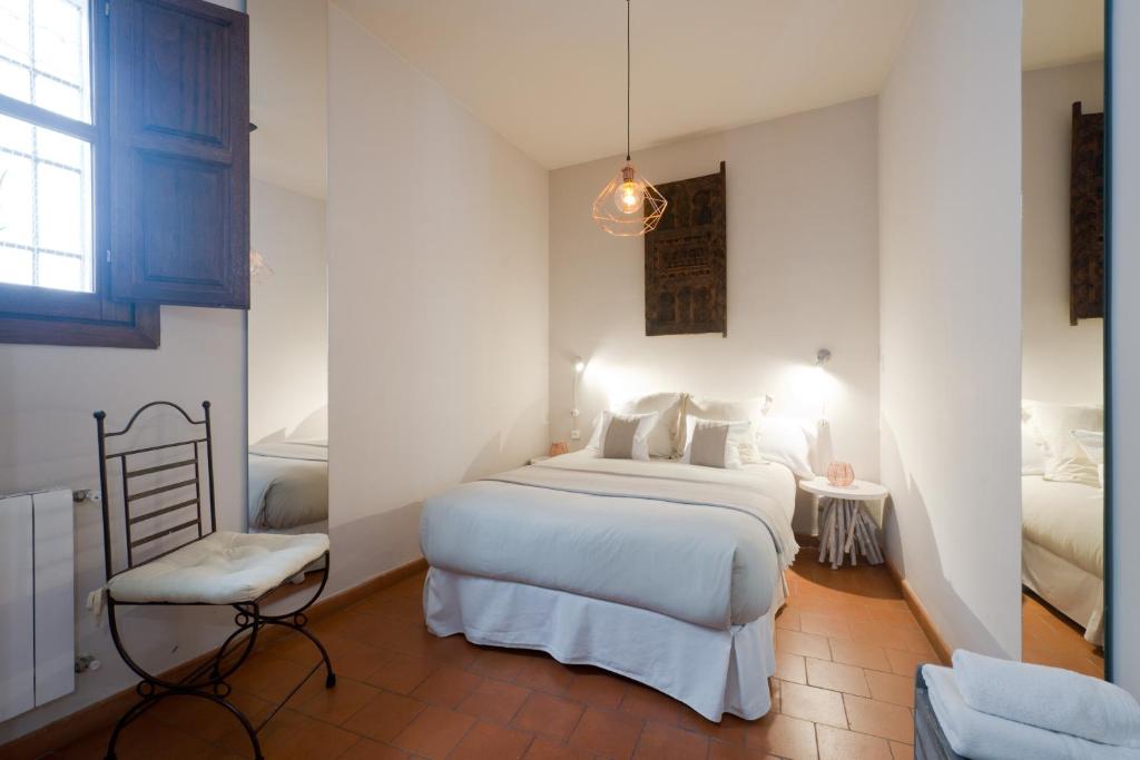 Postel nebo postele na pokoji v ubytování Casa Bombo