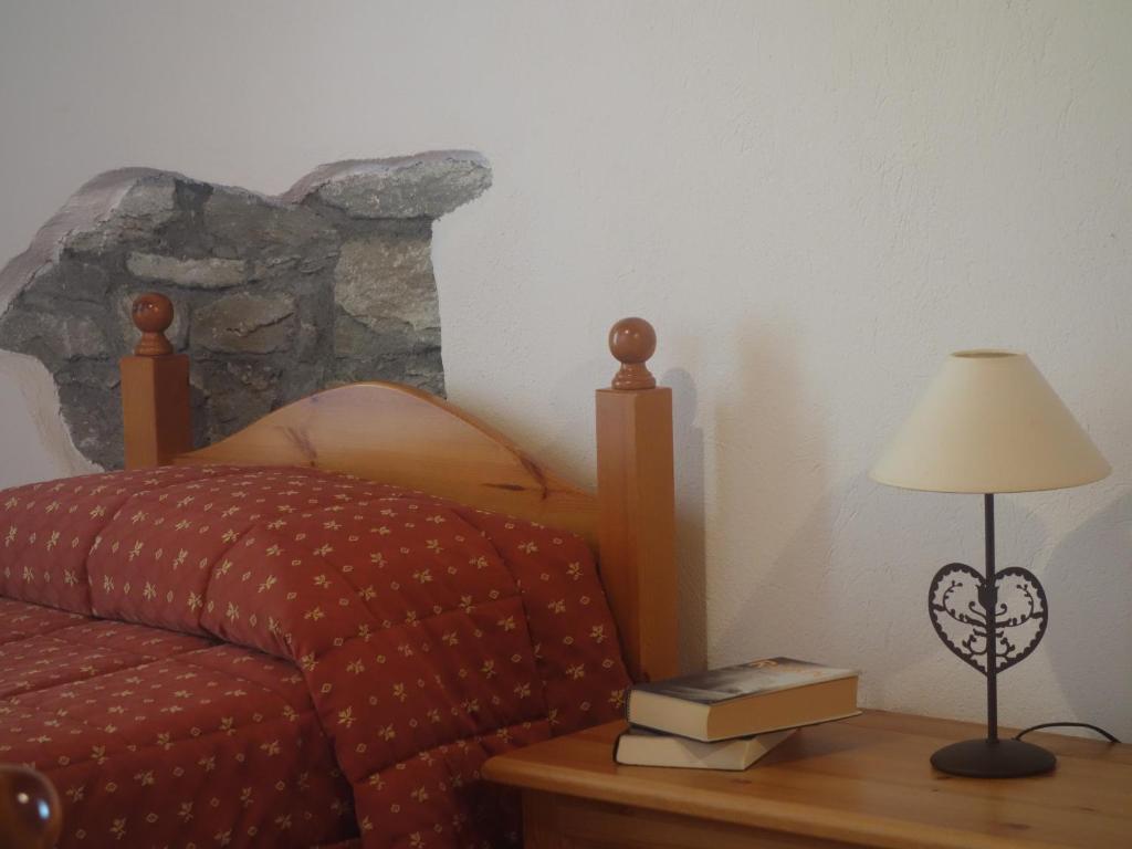 Postel nebo postele na pokoji v ubytování Auberge Lou Créton di Lui Hostel