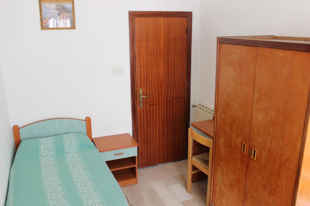 Postel nebo postele na pokoji v ubytování Hotel Taormina