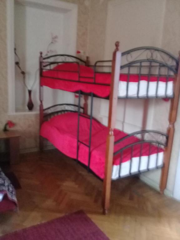 Postel nebo postele na pokoji v ubytování TLT Guest House
