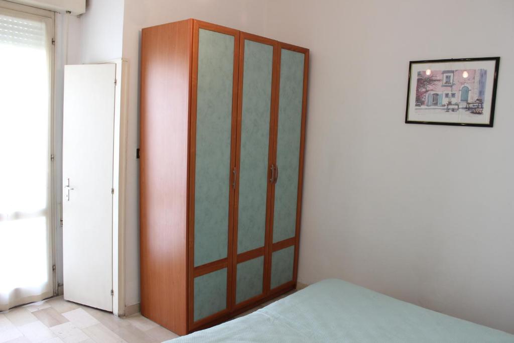 Postel nebo postele na pokoji v ubytování Hotel Taormina
