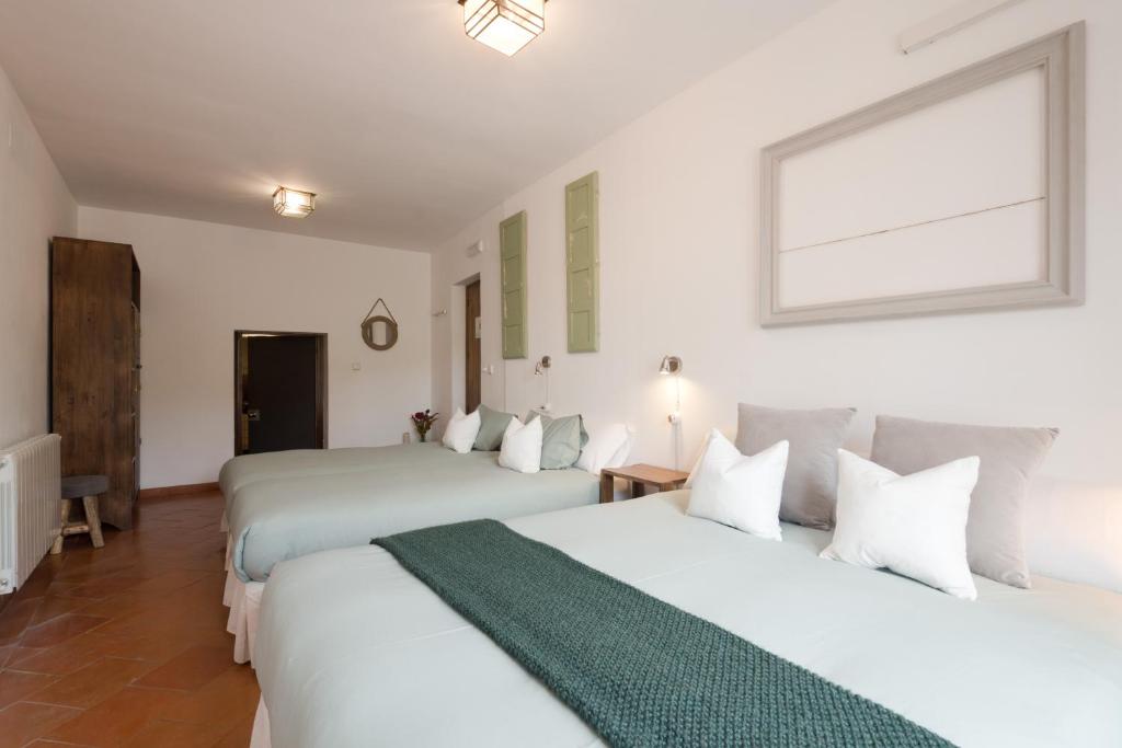 Postel nebo postele na pokoji v ubytování Casa Bombo