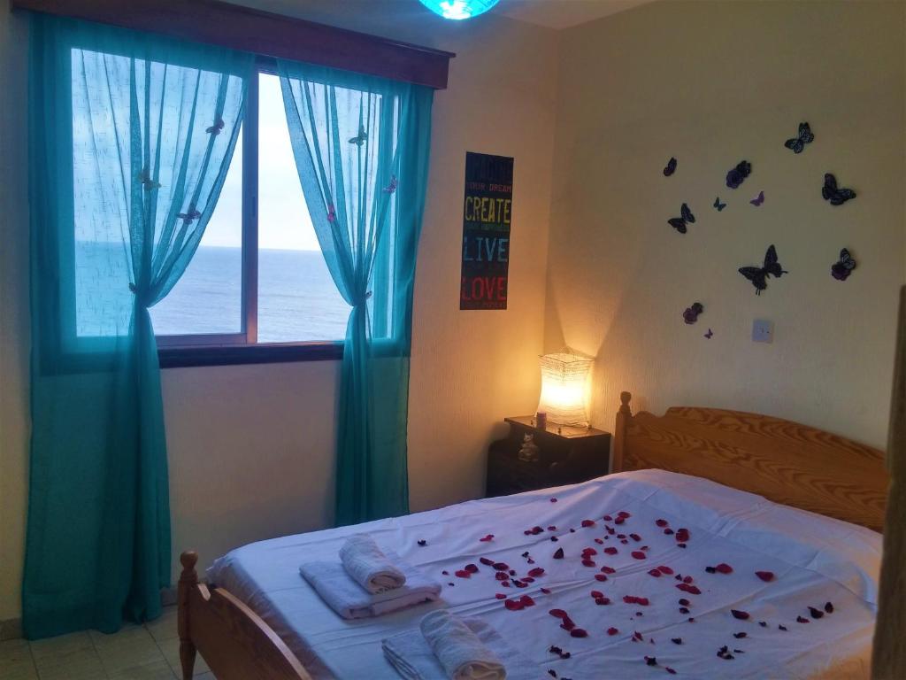 Postel nebo postele na pokoji v ubytování 777 Beach Guesthouse