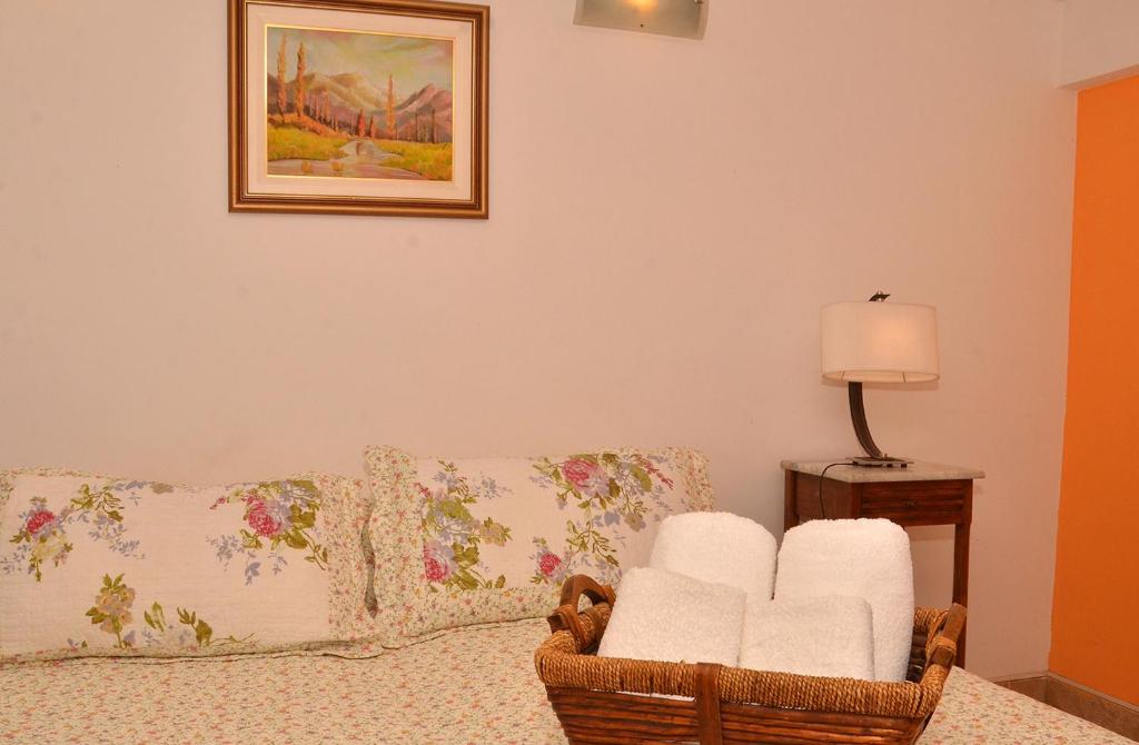 Postel nebo postele na pokoji v ubytování Apart Hotel La Busqueda