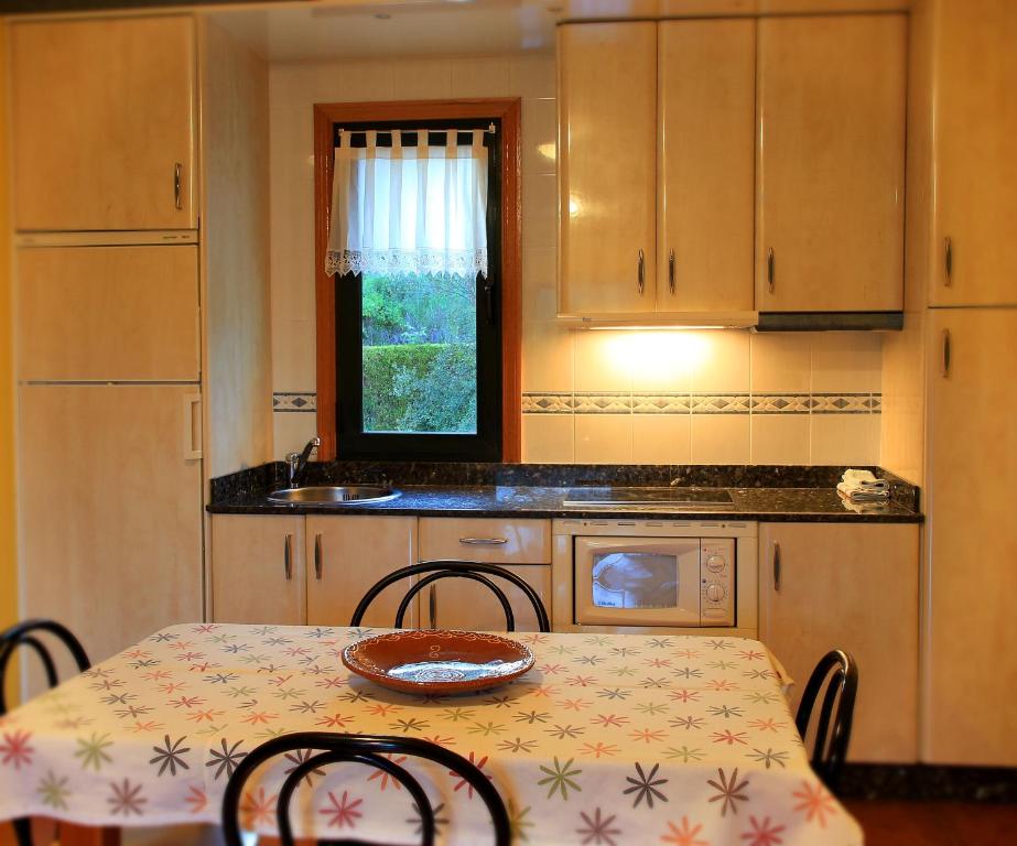 Kuchyň nebo kuchyňský kout v ubytování Alojamiento en entorno rural Los Trobos