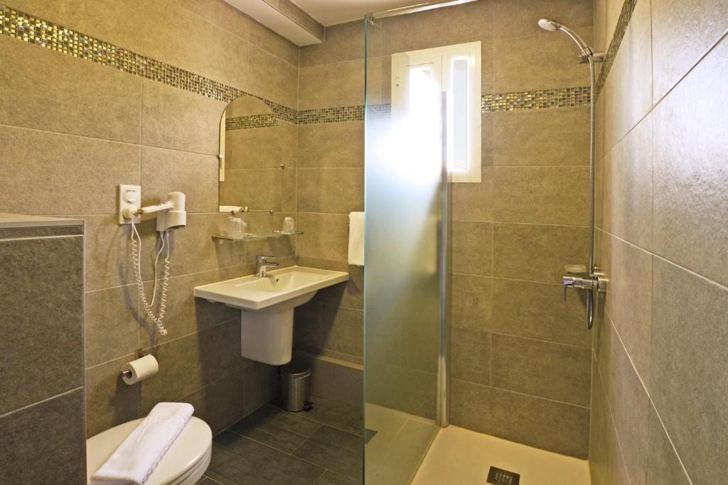 Koupelna v ubytování Hôtel la Palma