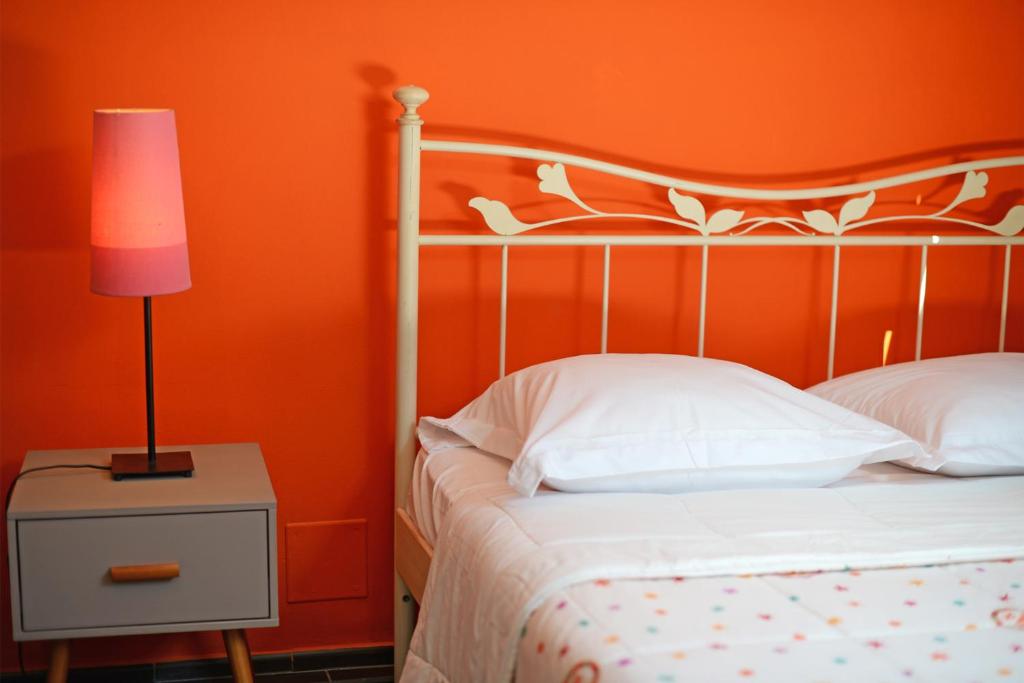 Postel nebo postele na pokoji v ubytování Hôtel la Palma